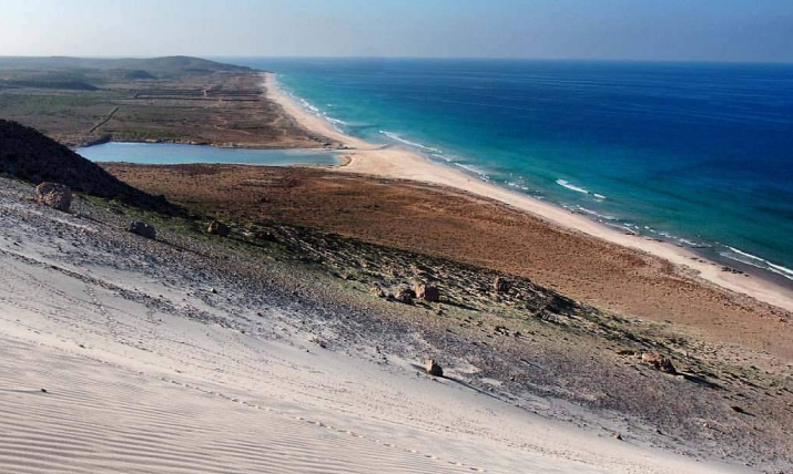 Delisha Beach in Socotra, known for its golden sands and turquoise waters, offering a tranquil and untouched paradise.